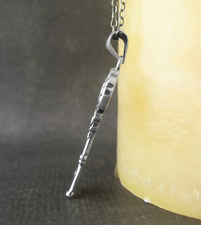 Old-Fashioned Celtic Key With Triskelion Pendant